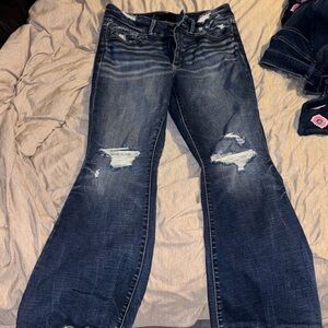 Buckle Dark Blue Flare Jeans with Distressed Details